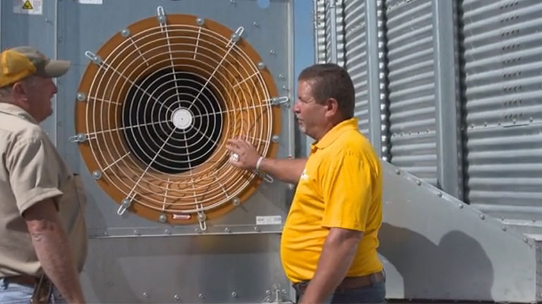 Dealer showing a customer a GSI centrifugal fan